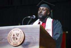 Chris Taite, an inaugural graduate of the Bachelor of Arts in Liberal Studies online degree completion program, delivers his student speech at the May 2023 Commencement ceremony.